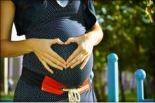 Pregnancy-Discrimination Lawyer - Pregnant Woman with hands on stomach