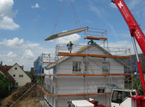 implied-warranty-construction - construction site scaffolding house