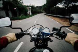 Motorcycle Accident Lawyer Nashua, NH - Motorcycle handlebar POV on road highway